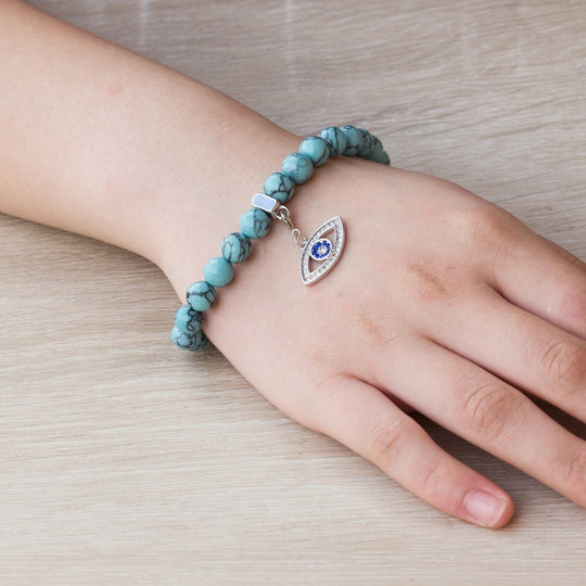 Synthetic Turquoise Gemstone Stretch Bracelet with Charm Created with Zircondia® Crystals - Philip Jones Jewellery