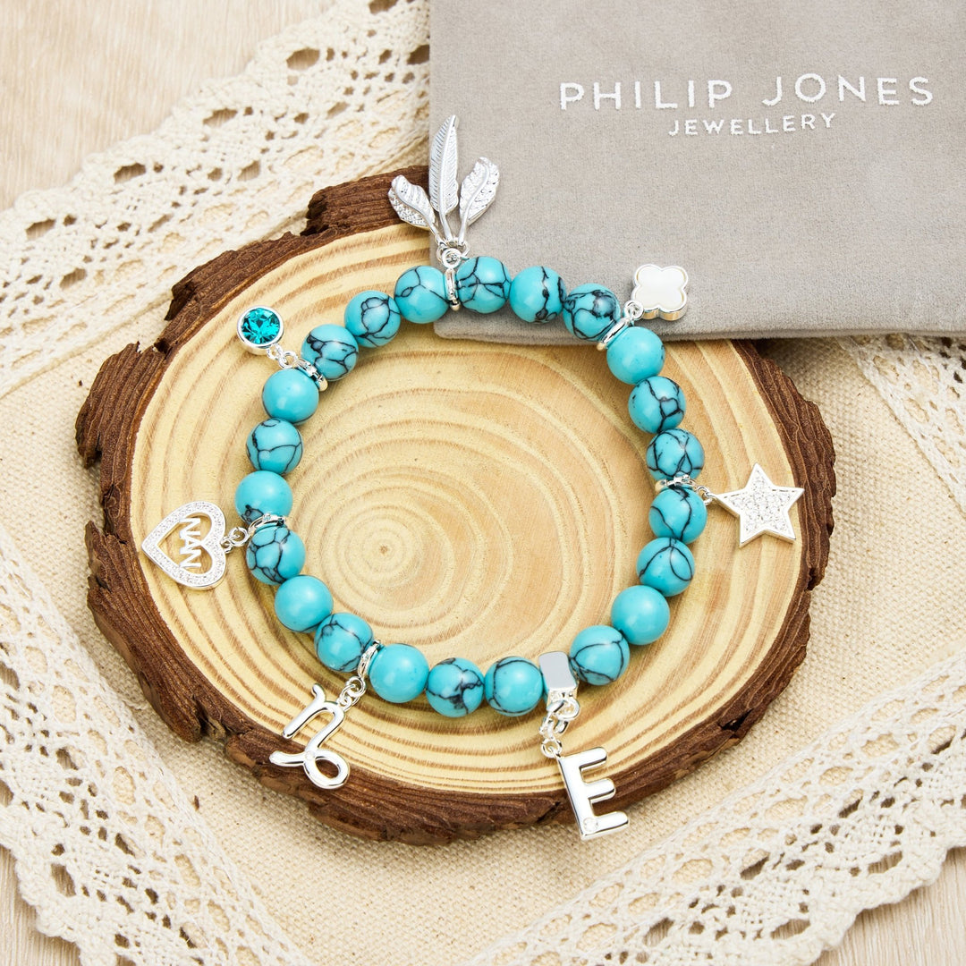 Synthetic Turquoise Gemstone Stretch Bracelet with Option of Charms - Philip Jones Jewellery