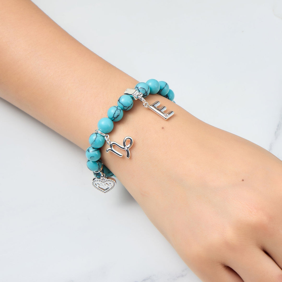 Synthetic Turquoise Gemstone Stretch Bracelet with Option of Charms - Philip Jones Jewellery