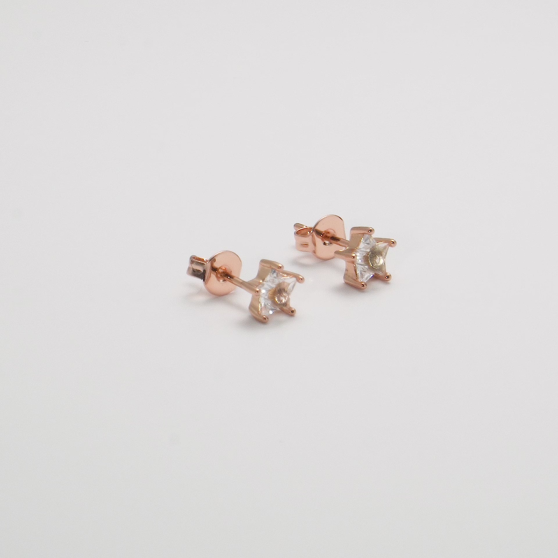 Rose Gold Plated Star Earrings Created with Zircondia® Crystals Video