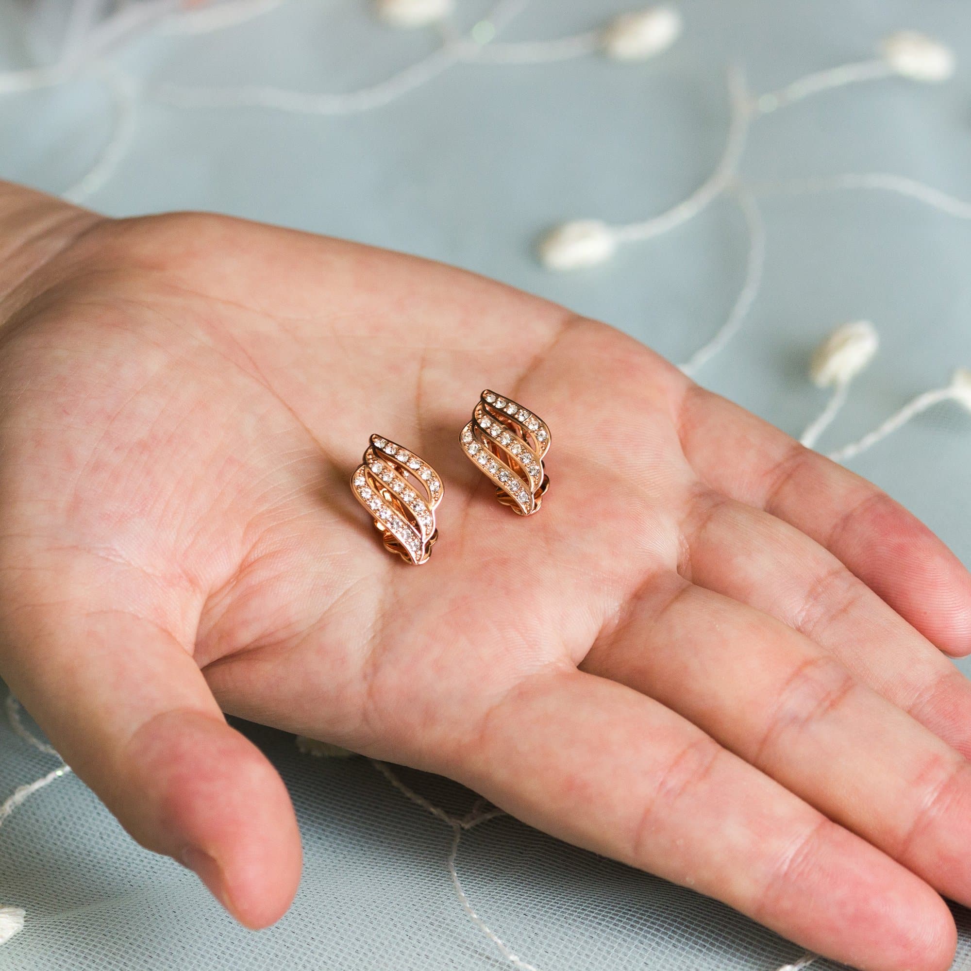 Rose Gold Plated Triple Row Clip On Earrings Created with Zircondia® Crystals