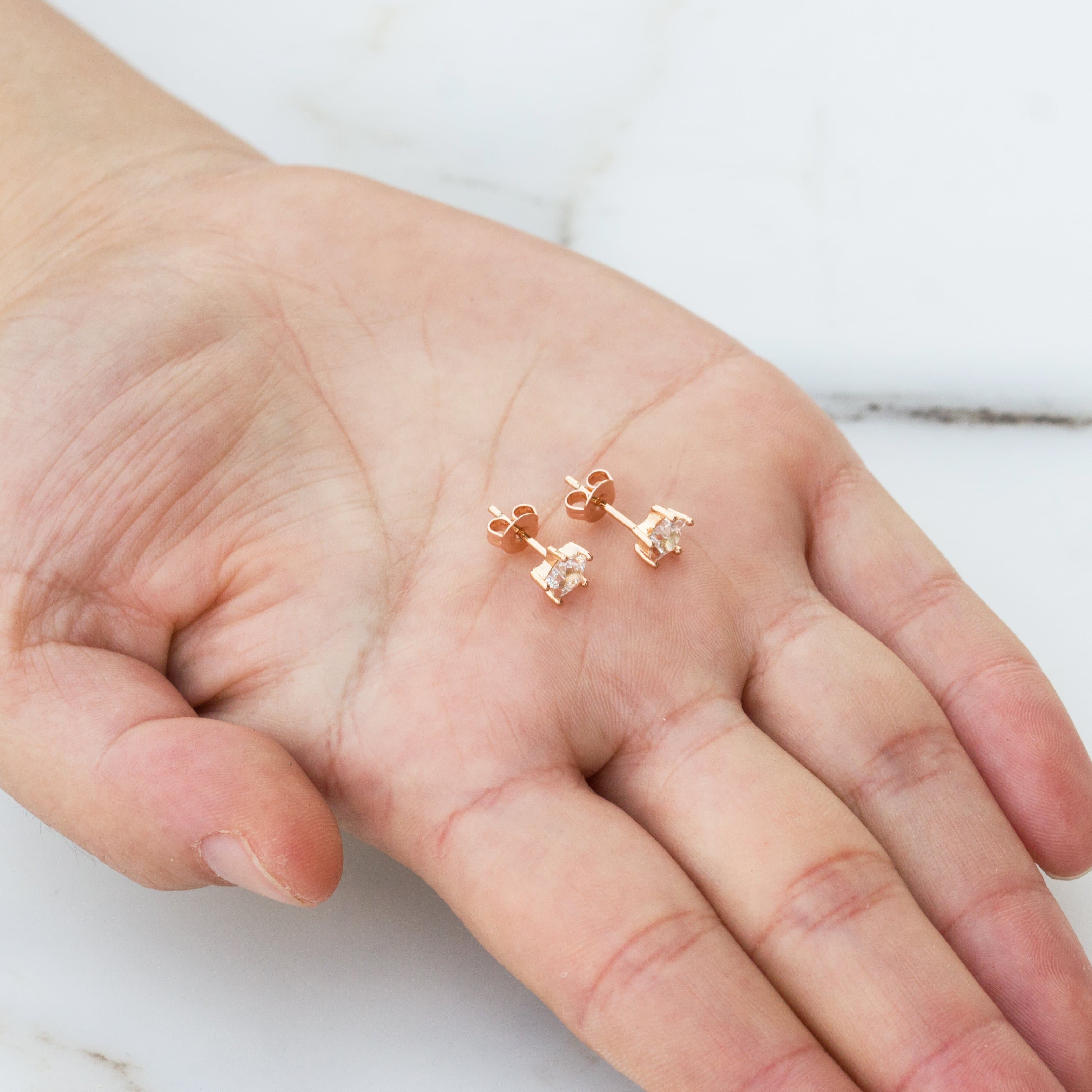 Rose Gold Plated Star Earrings Created with Zircondia® Crystals
