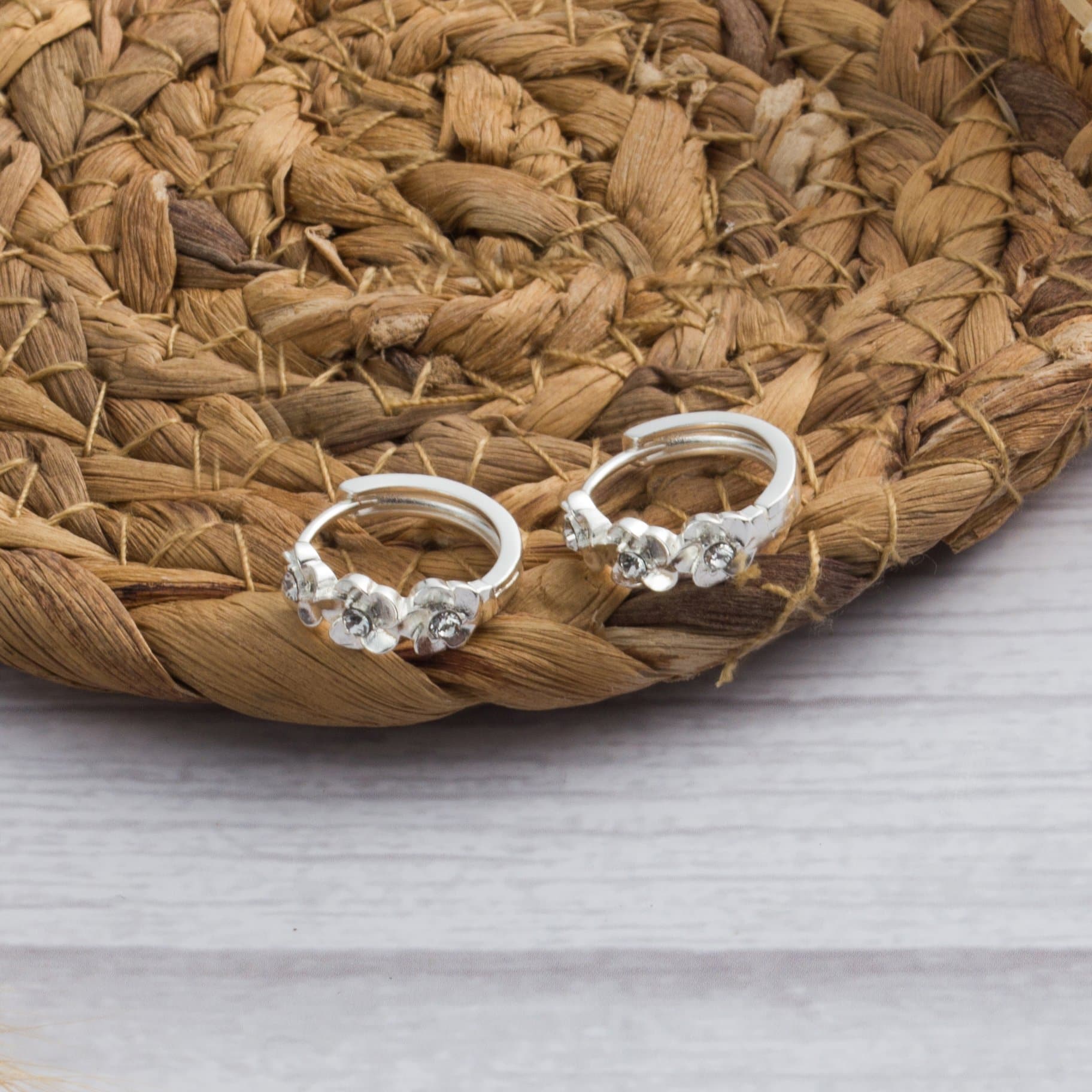 Silver Plated Flower Hoop Earrings Created with Zircondia® Crystals