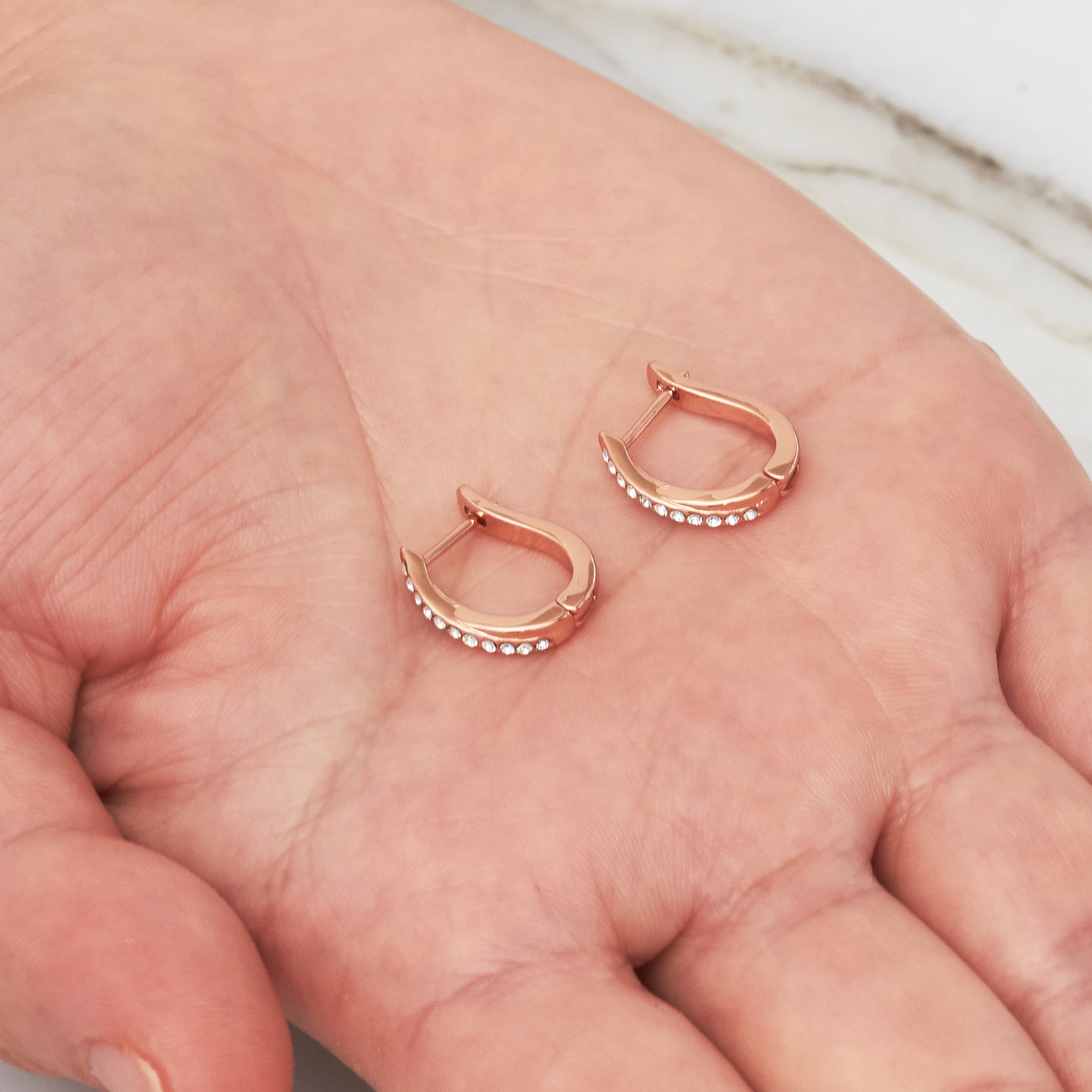 Rose Gold Plated Crossover Hoop Earrings Created with Zircondia® Crystals