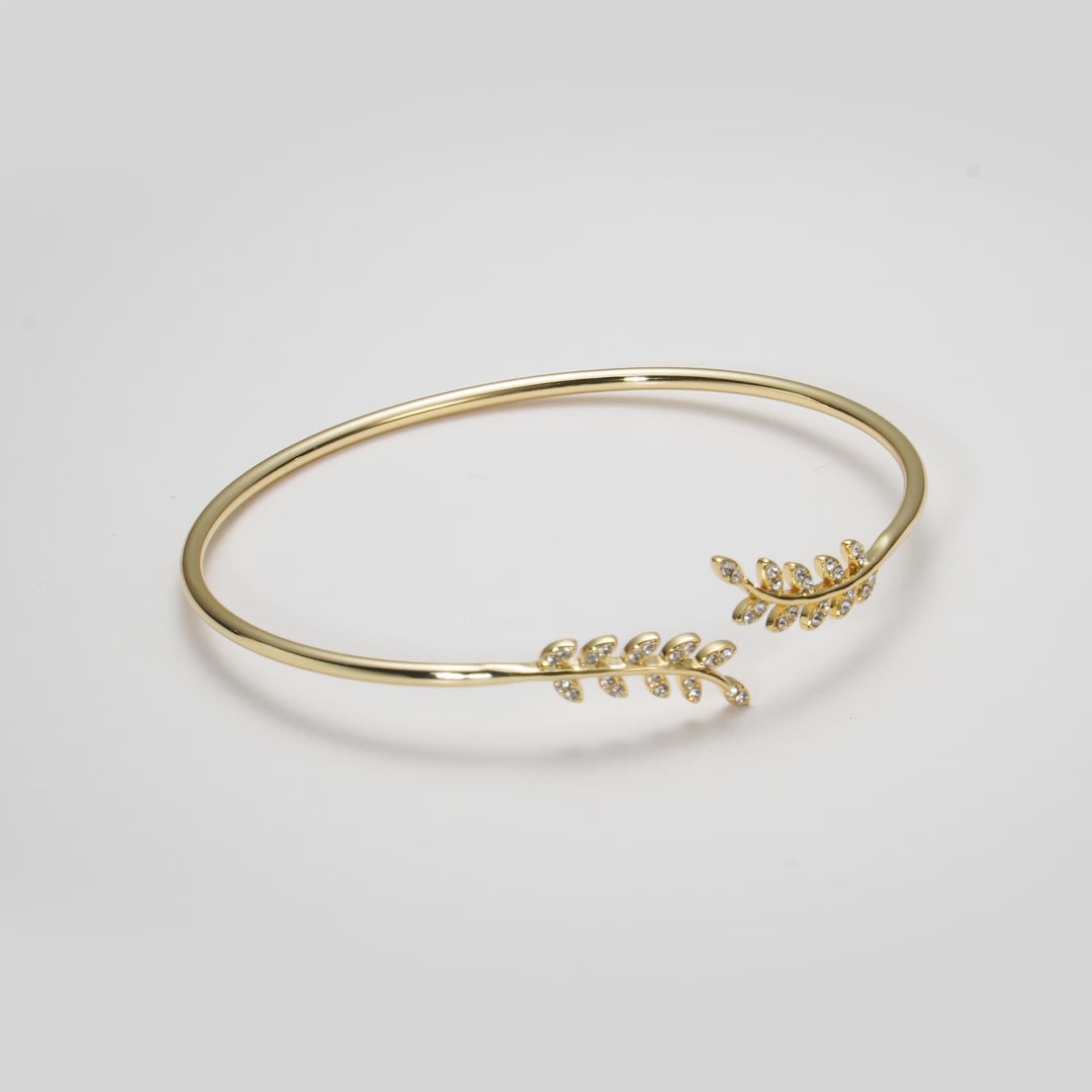 Gold Plated Leaf Bangle Created with Zircondia® Crystals Video