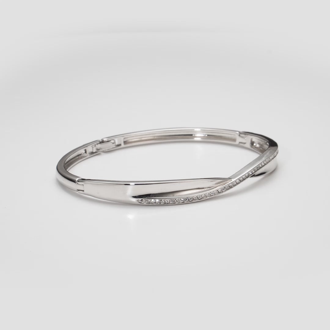 Silver Plated Arc Bangle Created with Zircondia® Crystals Video