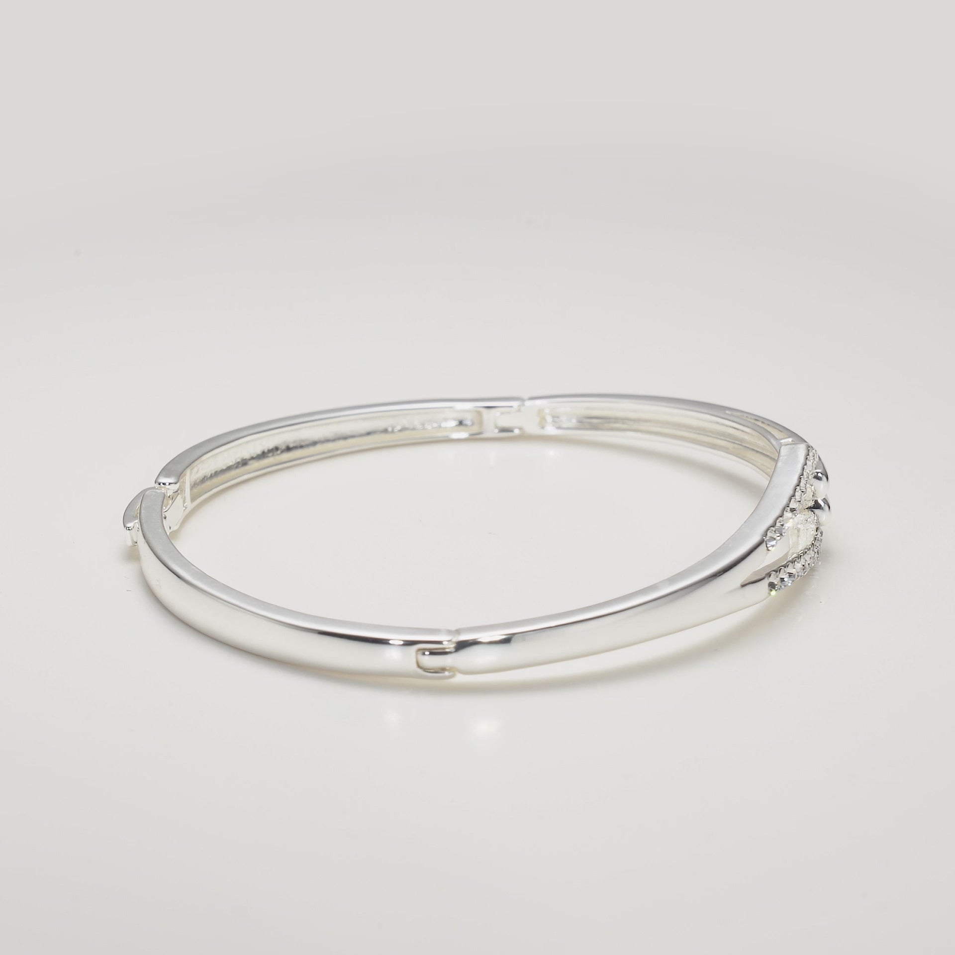 Silver Plated Link Bangle Created with Zircondia® Crystals Video
