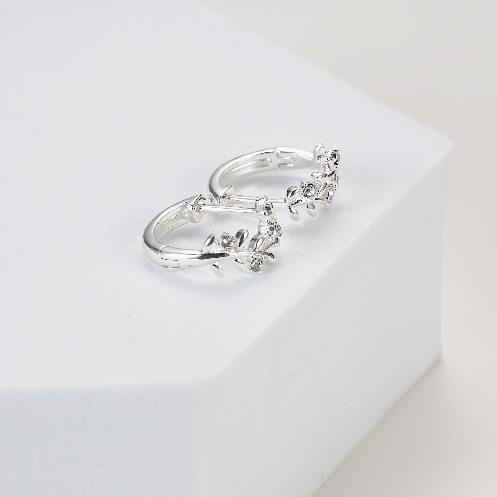 Silver Plated Leaf Hoop Earrings Created with Zircondia® Crystals Video
