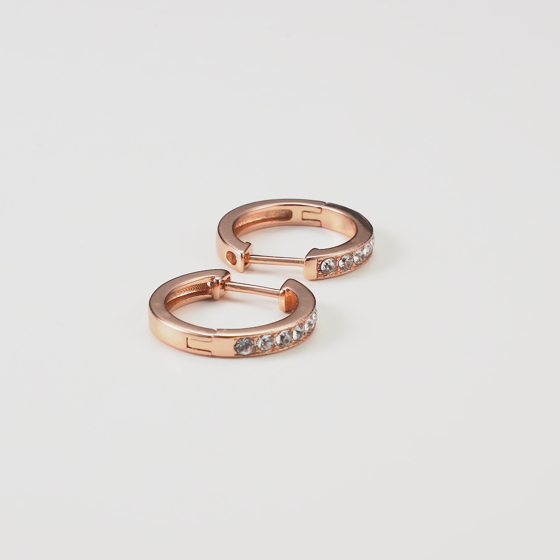Rose Gold Plated Hoop Earrings Created with Zircondia® Crystals