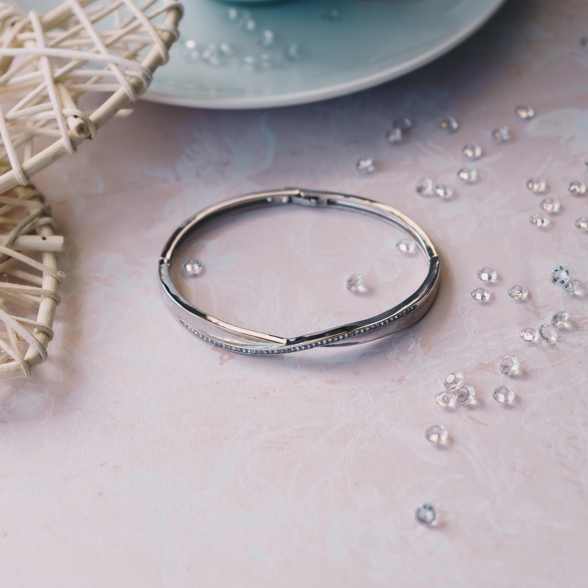 Silver Plated Arc Bangle Created with Zircondia® Crystals