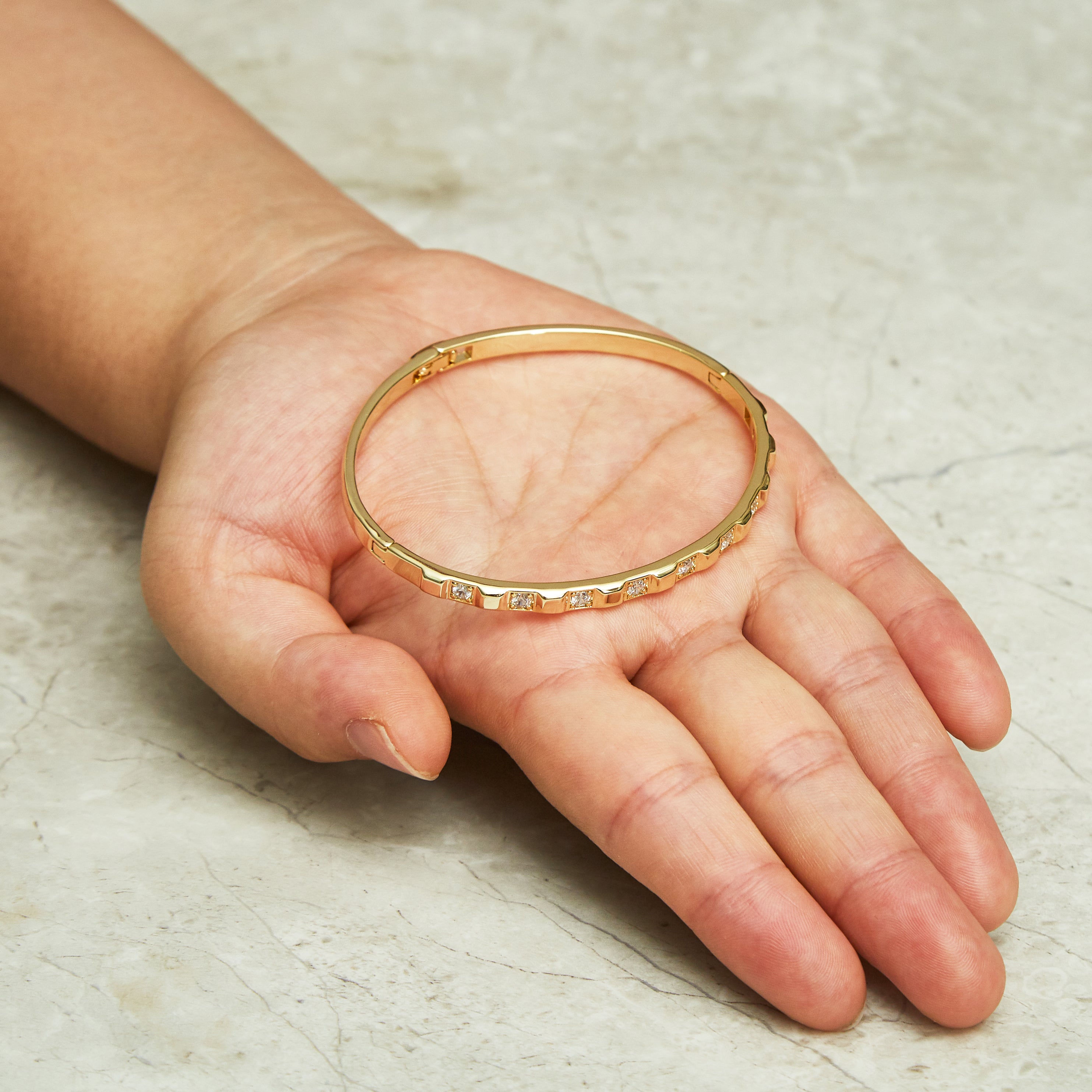 Gold Plated Cubic Bangle Created with Zircondia® Crystals