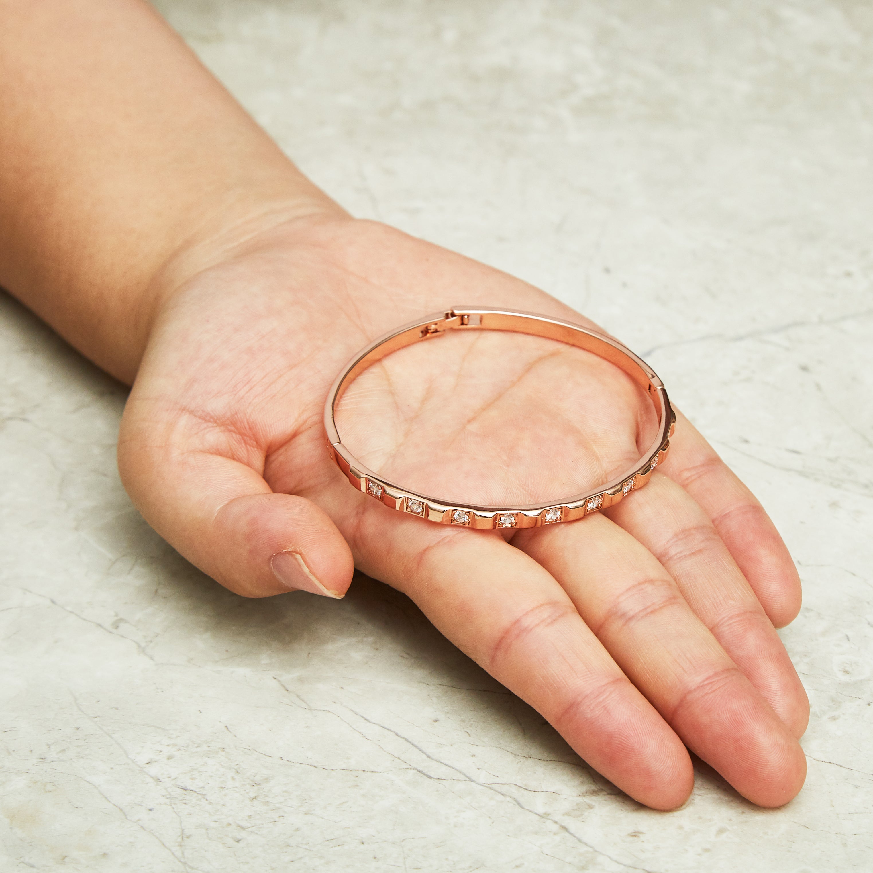Rose Gold Plated Cubic Bangle Created with Zircondia® Crystals