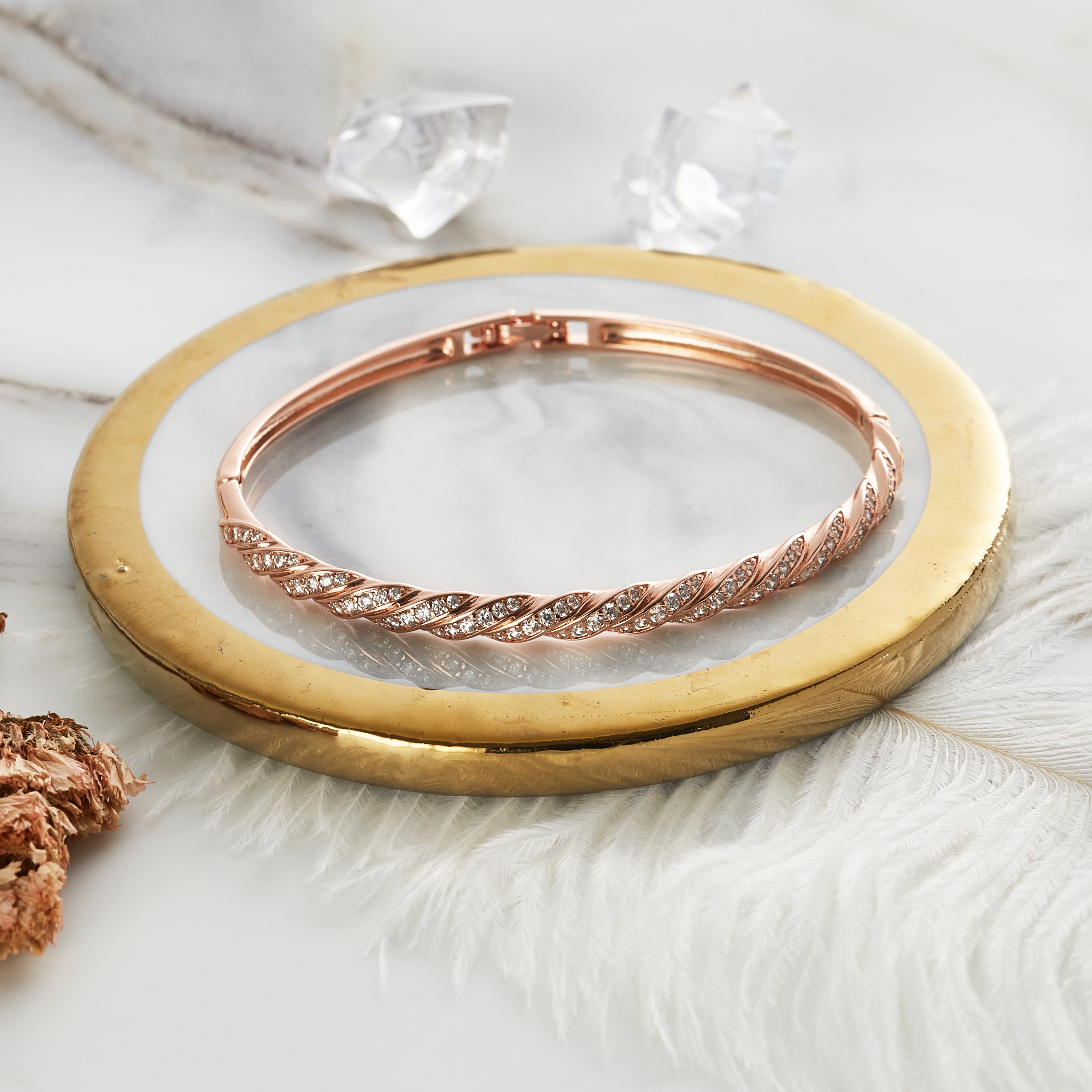 Rose Gold Plated Twist Bangle Created with Zircondia® Crystals