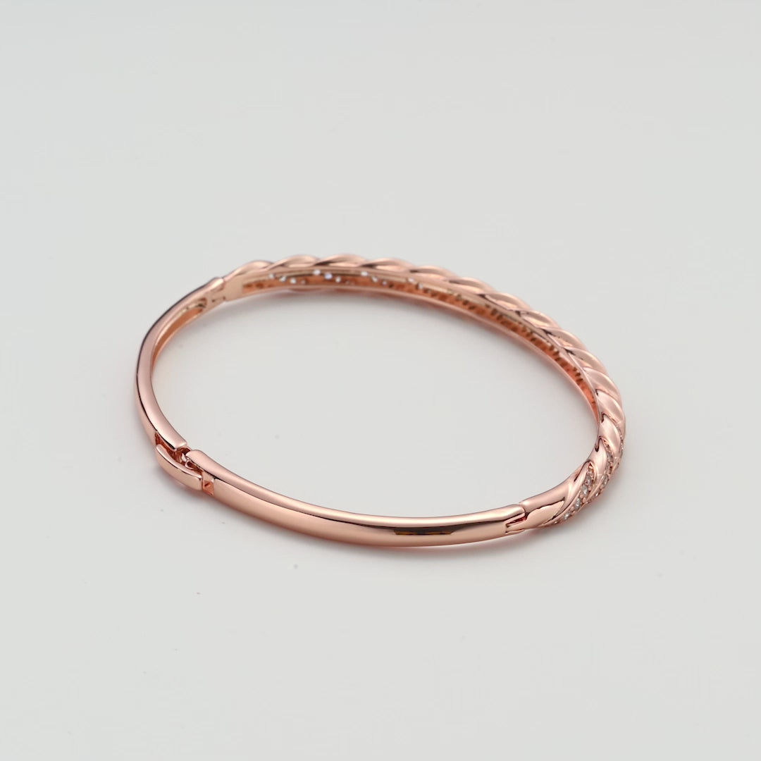 Rose Gold Plated Twist Bangle Created with Zircondia® Crystals Video