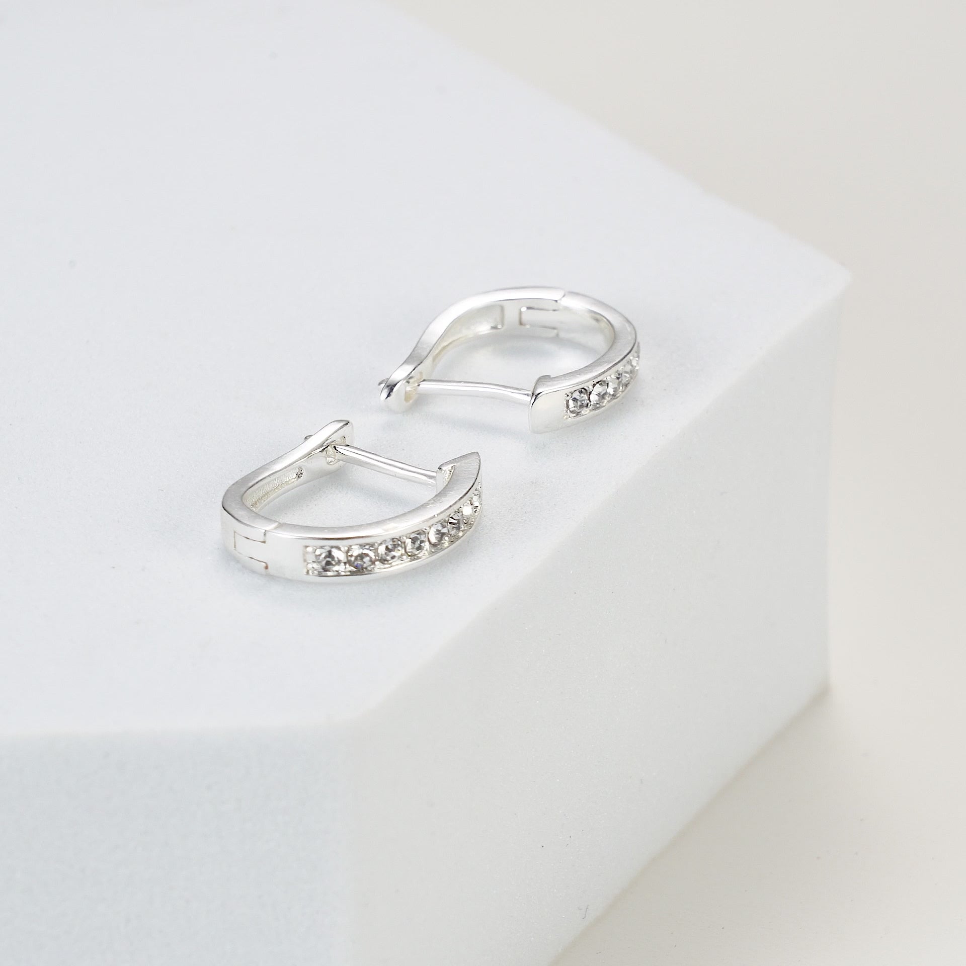 Silver Plated Channel Set Hoop Earrings Created with Zircondia® Crystals Video