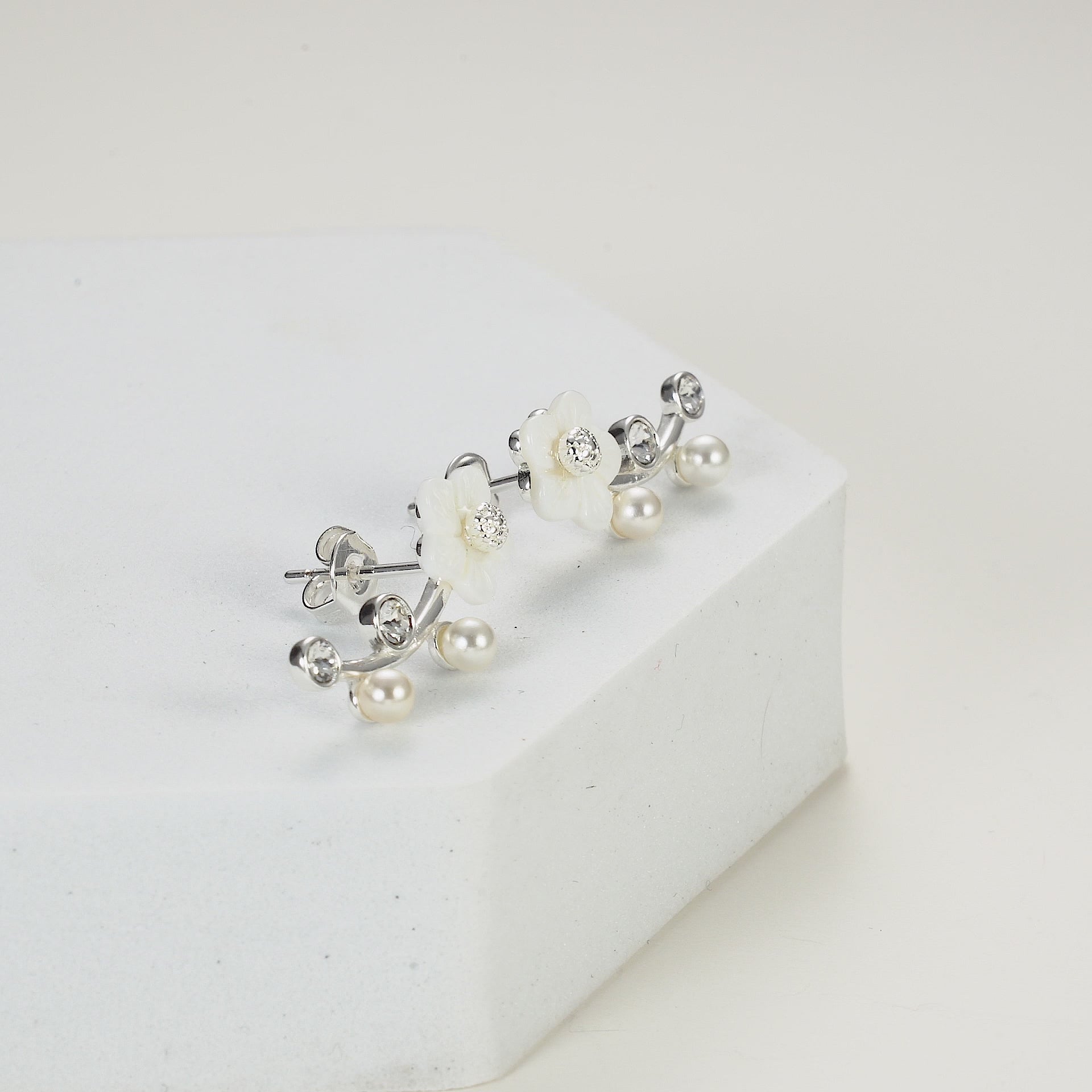 Silver Plated Daisy Climber Earrings Created with Zircondia® Crystals