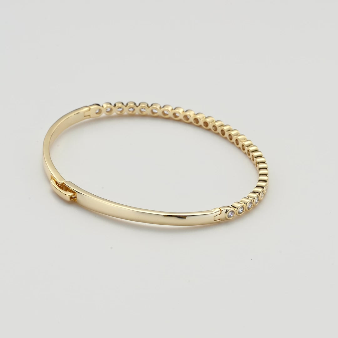 Gold Plated Tennis Bangle Created with Zircondia® Crystals