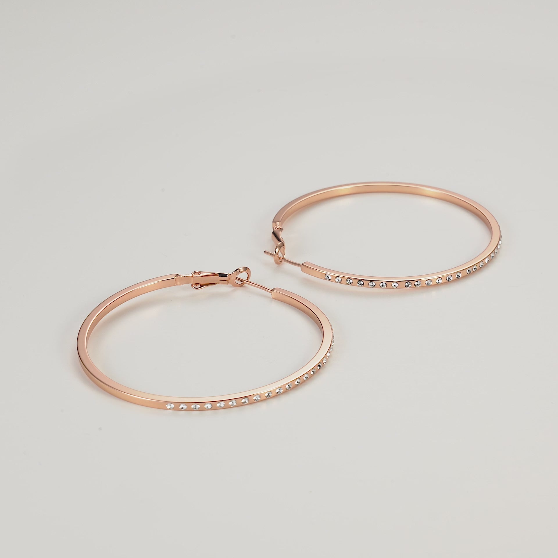 Rose Gold Plated 50mm Hoop Earrings Created with Zircondia® Crystals Video