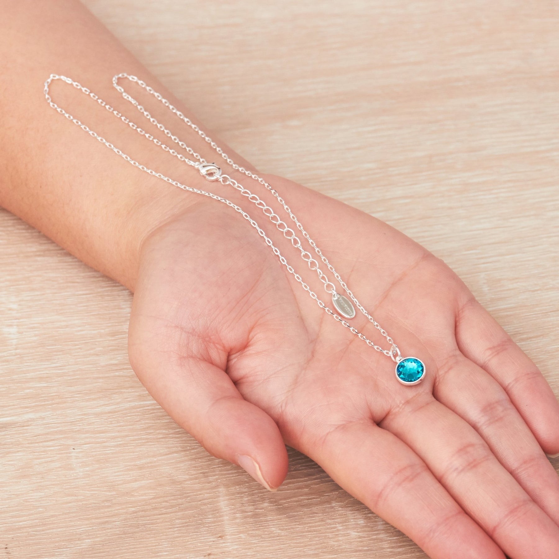 Silver Plated Necklace at Philip Jones Jewellery 7 blue crystal necklace created with zircondia crystals 403506