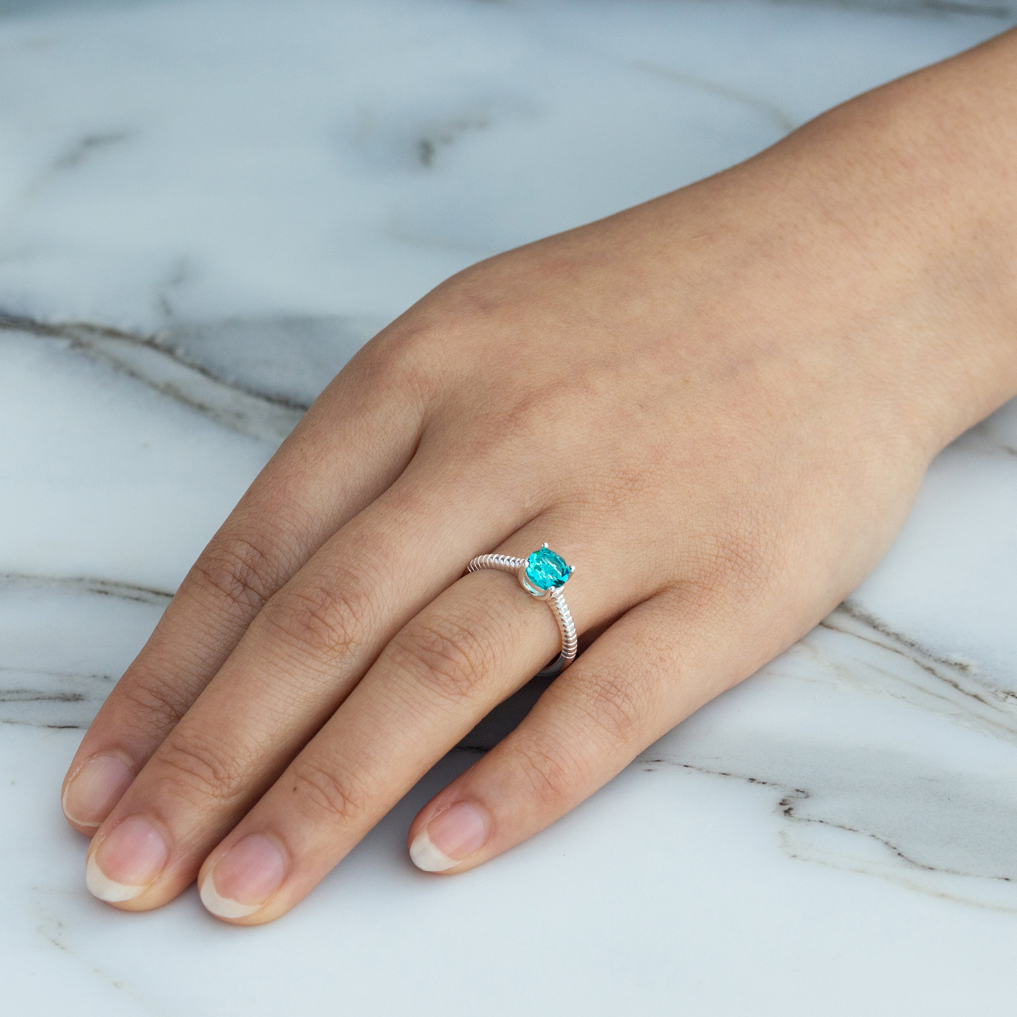 December (Blue Topaz) Adjustable Birthstone Ring Created with Zircondia® Crystals