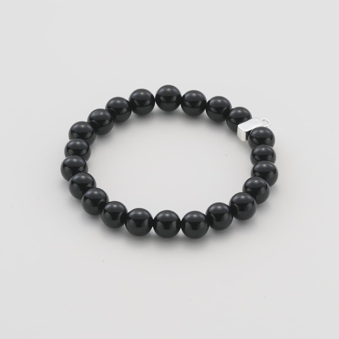 Black Onyx Gemstone Stretch Bracelet with Charm Created with Zircondia® Crystals Video