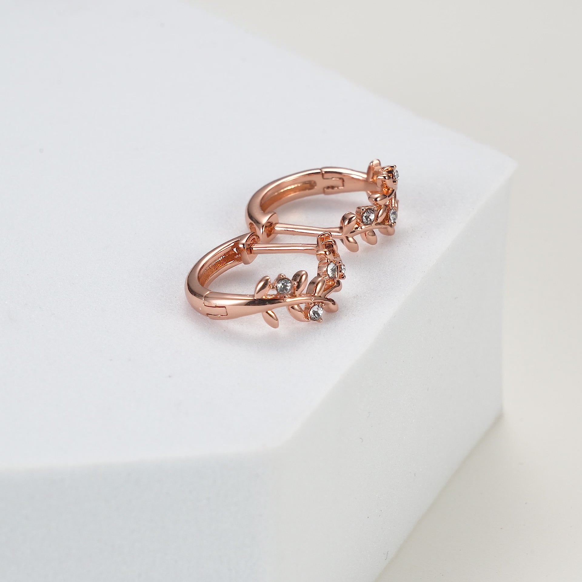 Rose Gold Plated Leaf Hoop Earrings Created with Zircondia® Crystals