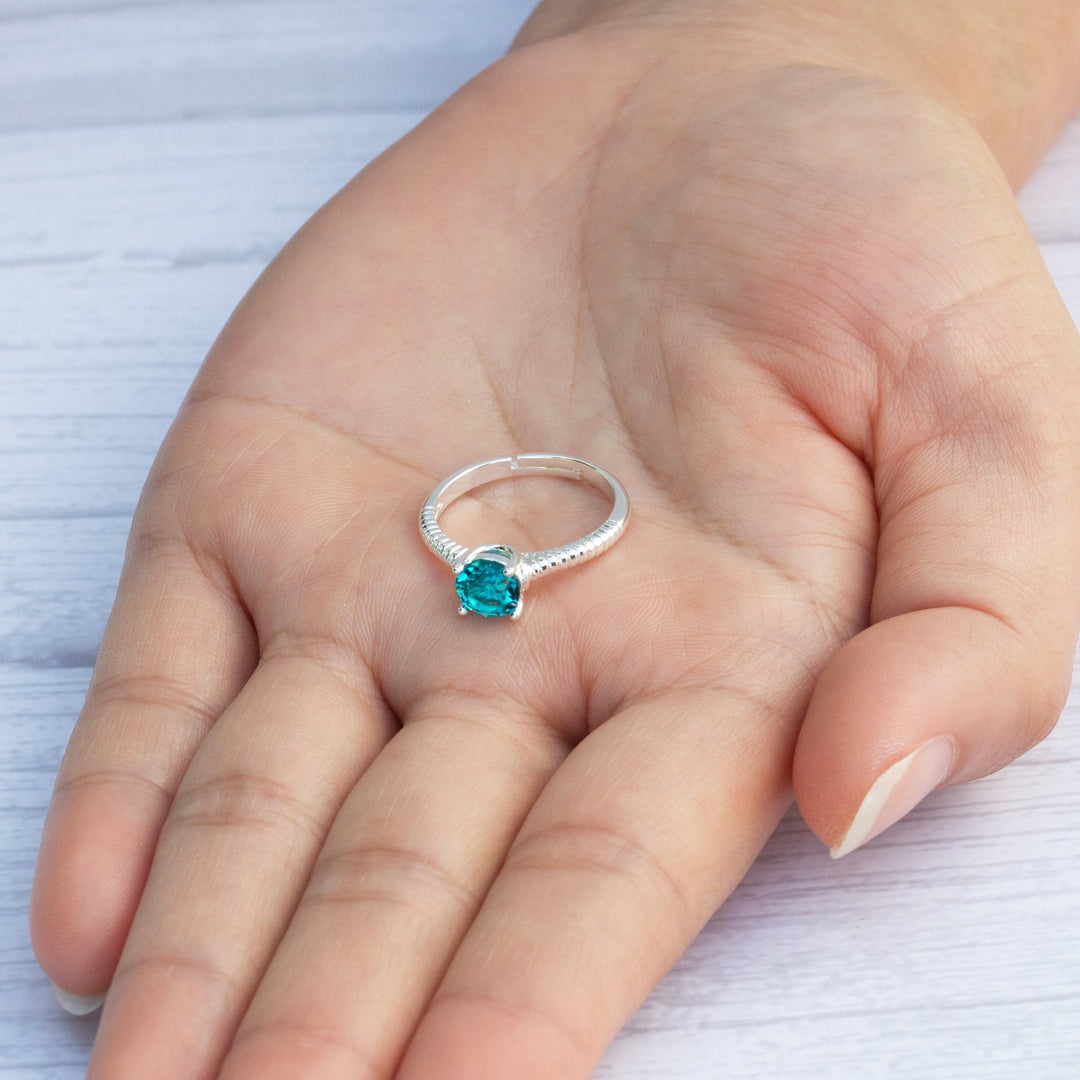 December (Blue Topaz) Adjustable Birthstone Ring Created with Zircondia® Crystals - Philip Jones Jewellery