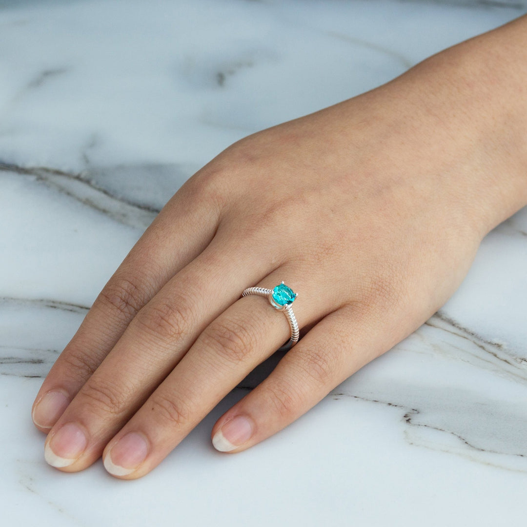 December (Blue Topaz) Adjustable Birthstone Ring Created with Zircondia® Crystals - Philip Jones Jewellery