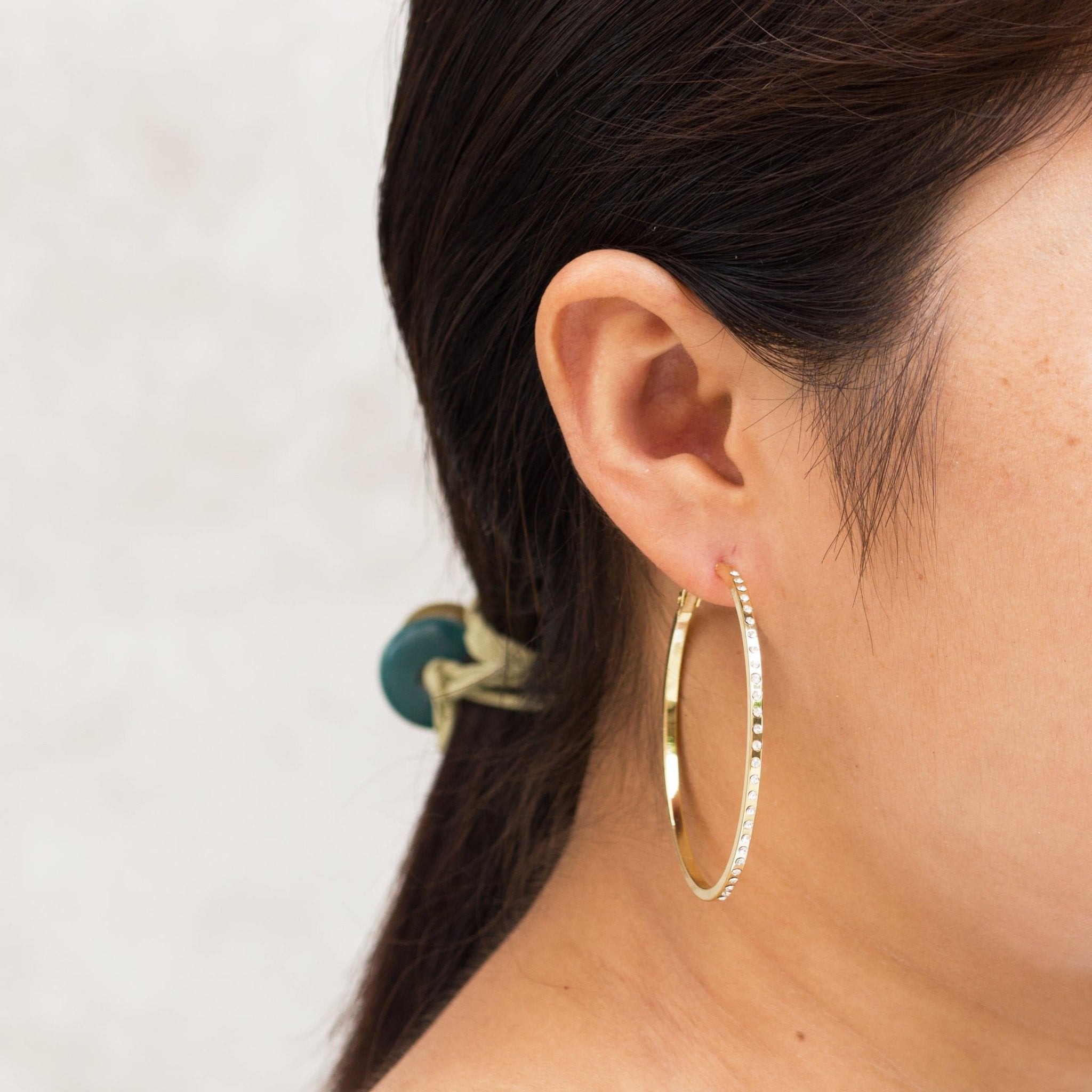 Gold Plated 50mm Hoop Earrings Created with Zircondia® Crystals - Philip Jones Jewellery