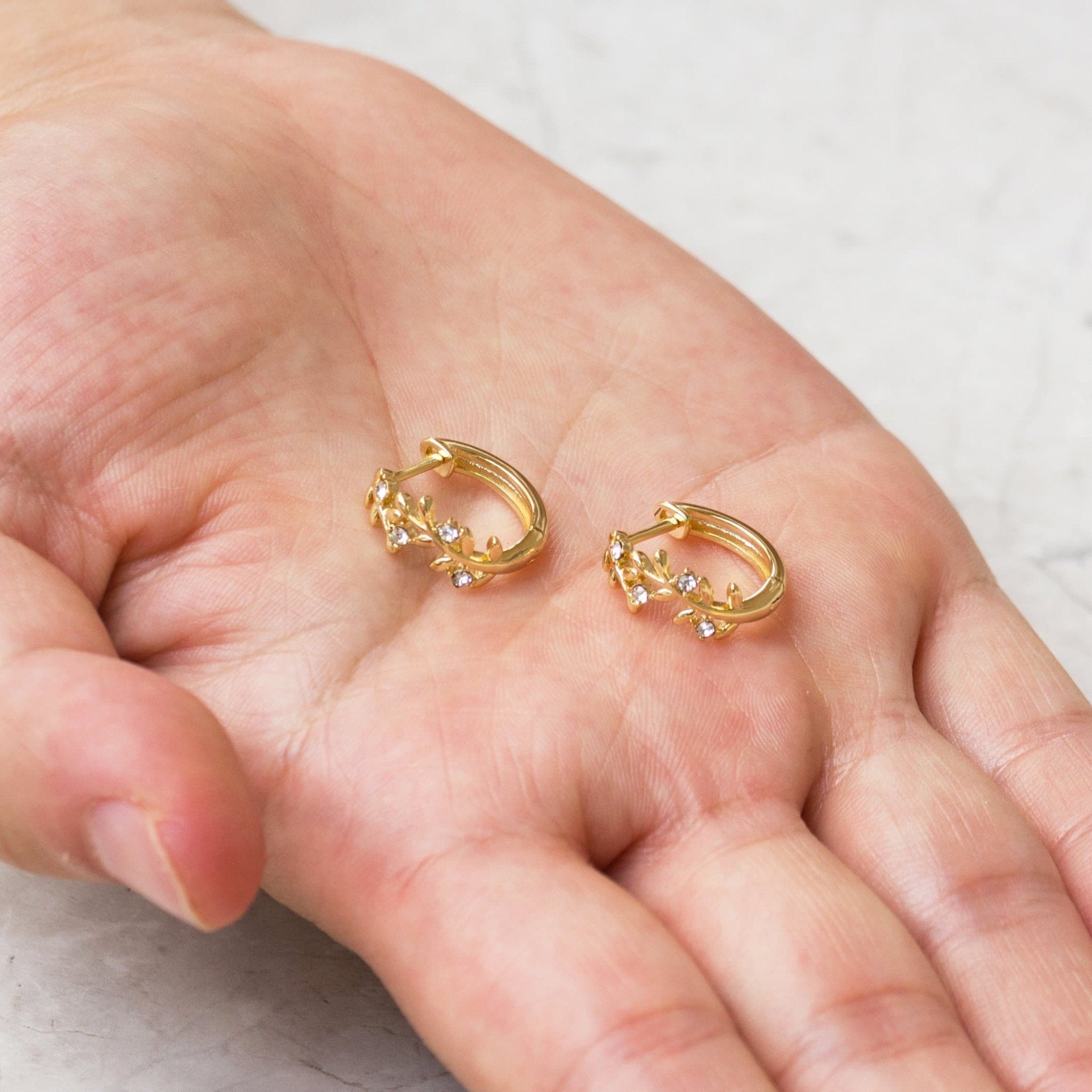 Gold Plated Leaf Hoop Earrings Created with Zircondia® Crystals - Philip Jones Jewellery