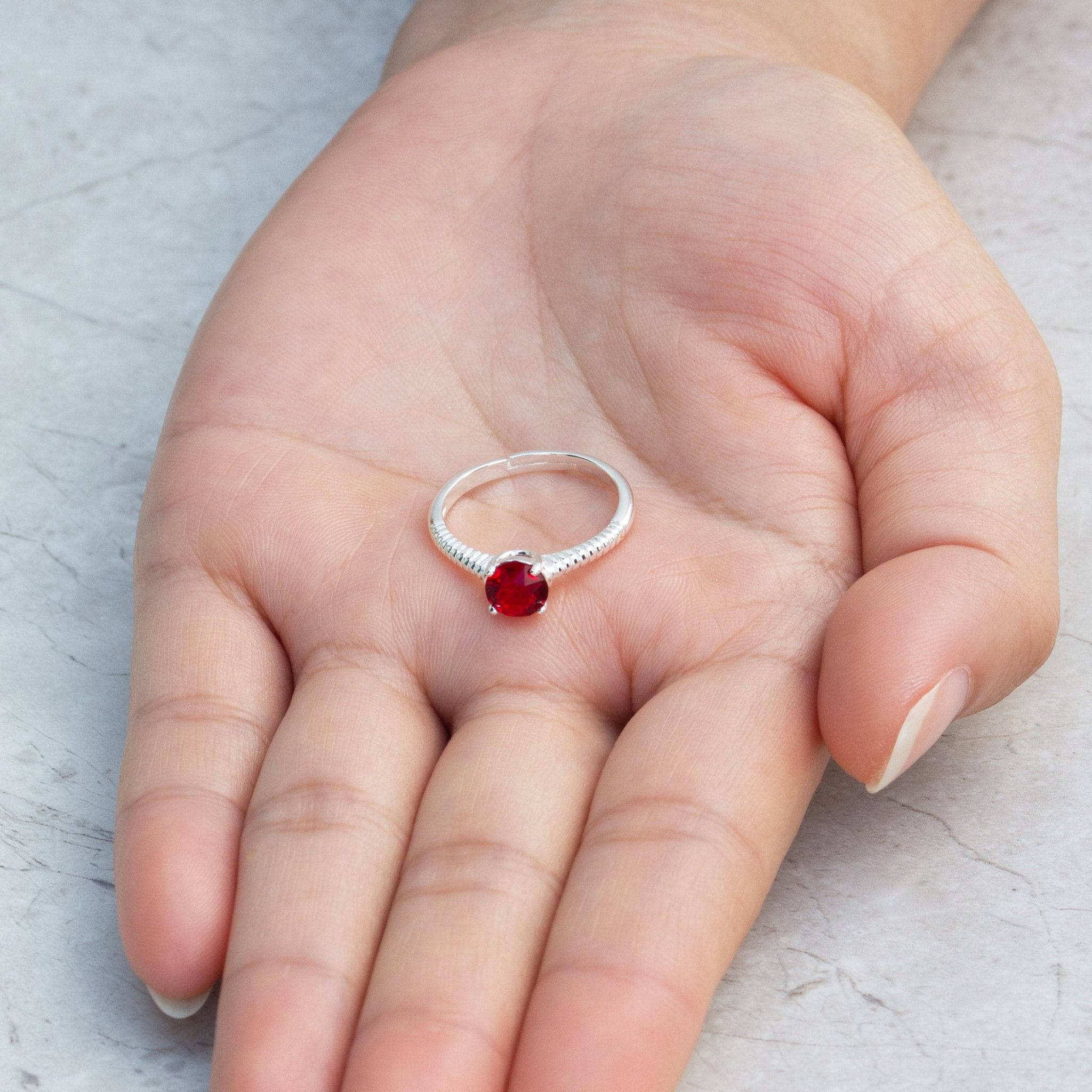 July (Ruby) Adjustable Birthstone Ring Created with Zircondia® Crystals - Philip Jones Jewellery