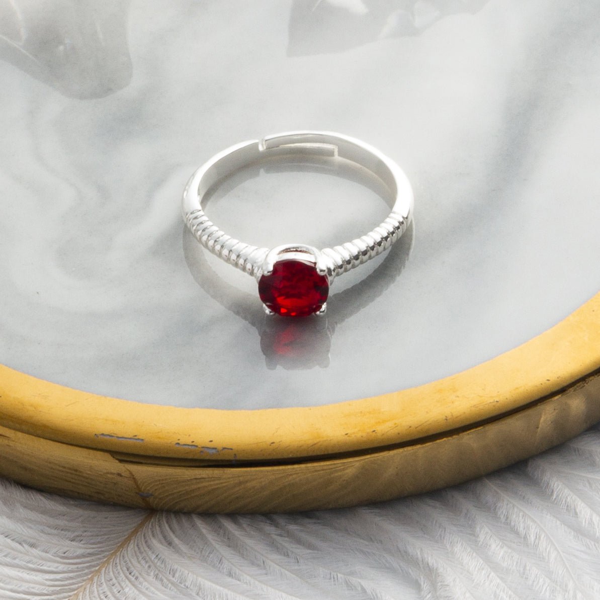 July (Ruby) Adjustable Birthstone Ring Created with Zircondia® Crystals - Philip Jones Jewellery