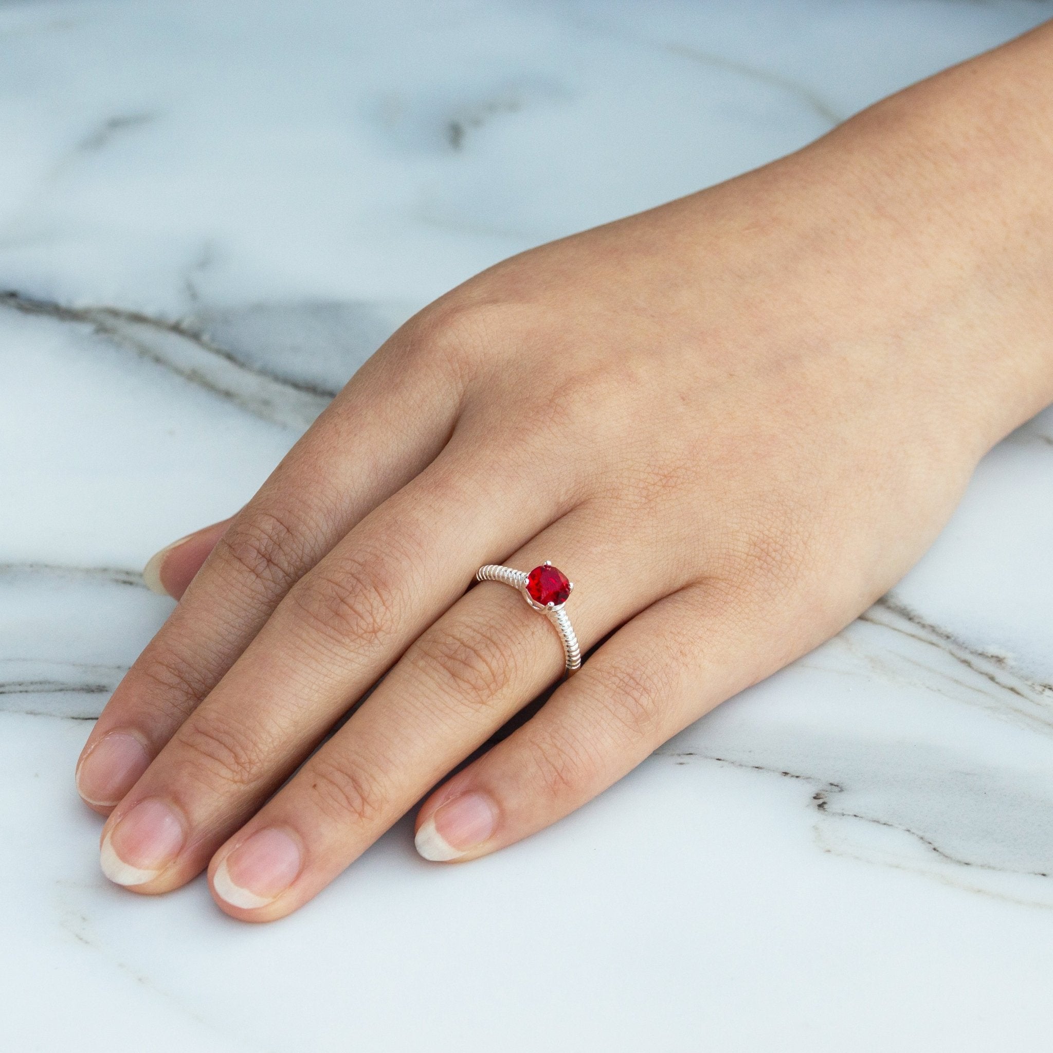 July (Ruby) Adjustable Birthstone Ring Created with Zircondia® Crystals - Philip Jones Jewellery