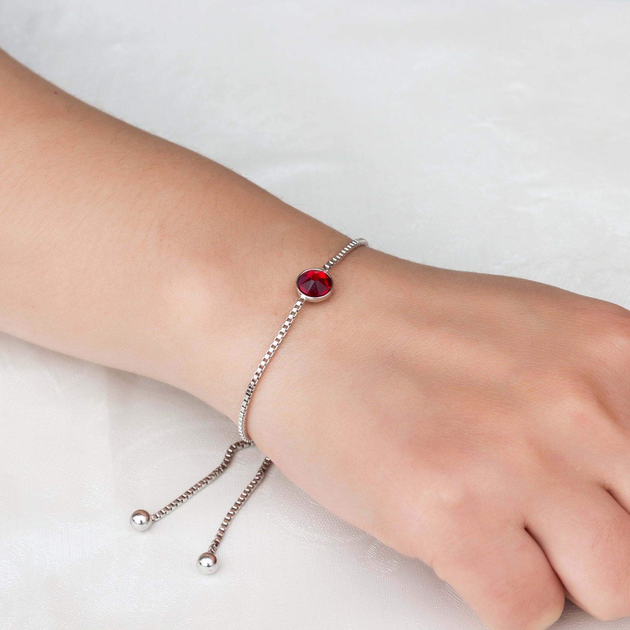 July (Ruby) Birthstone Bracelet Created with Zircondia® Crystals - Philip Jones Jewellery