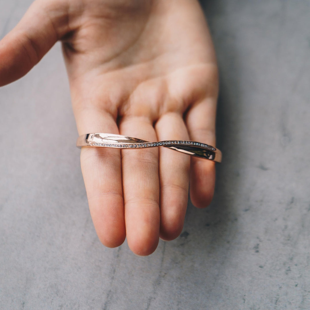 Rose Gold Plated Arc Bangle Created with Zircondia® Crystals (7 Inch) - Philip Jones Jewellery