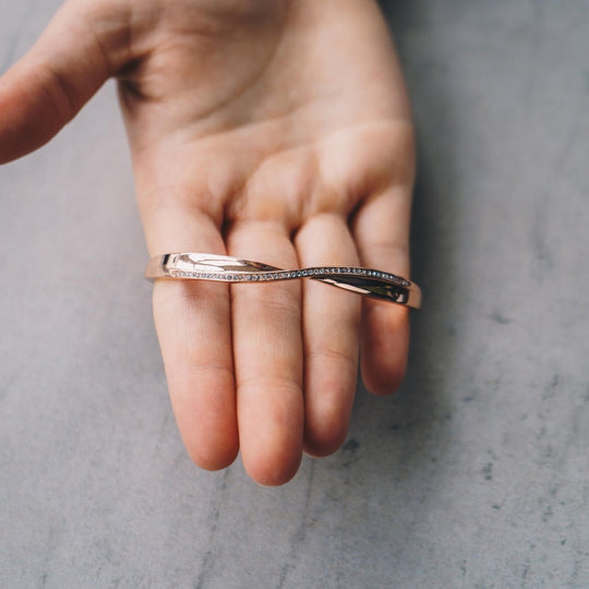 Rose Gold Plated Arc Bangle Created with Zircondia® Crystals (7 Inch) - Philip Jones Jewellery