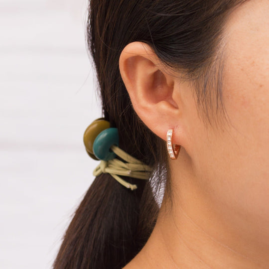 Rose Gold Plated Huggie Hoop Earrings Created with Zircondia® Crystals - Philip Jones Jewellery