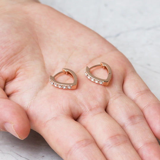 Rose Gold Plated Huggie Hoop Earrings Created with Zircondia® Crystals - Philip Jones Jewellery