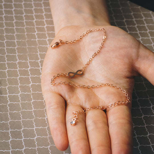 Rose Gold Plated Infinity Anklet Created with Zircondia® Crystals - Philip Jones Jewellery
