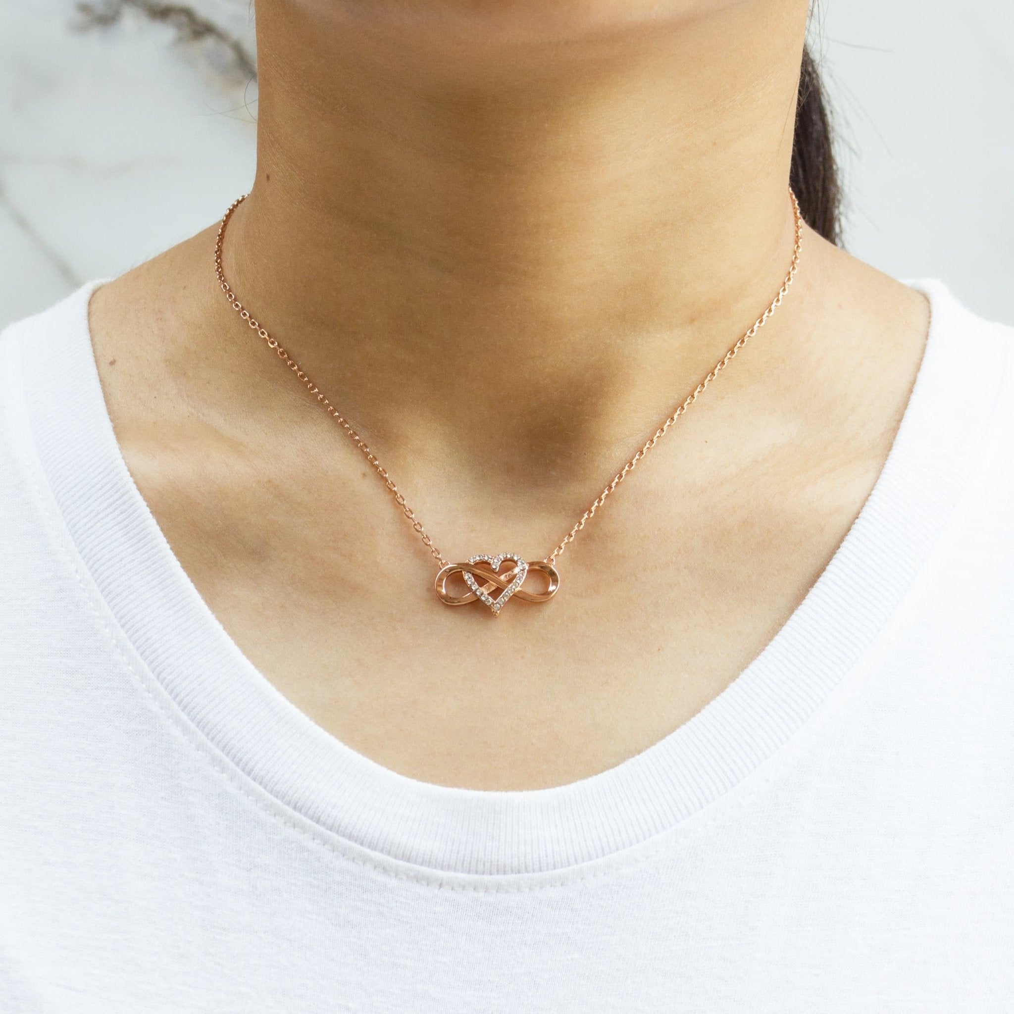 Rose Gold Plated Infinity Heart Necklace Created with Zircondia® Crystals - Philip Jones Jewellery