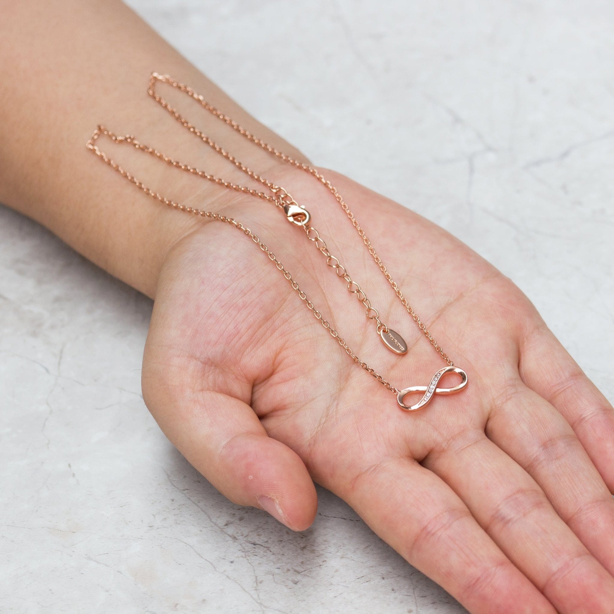 Rose Gold Plated Infinity Pendant Necklace Created with Zircondia® Crystals - Philip Jones Jewellery