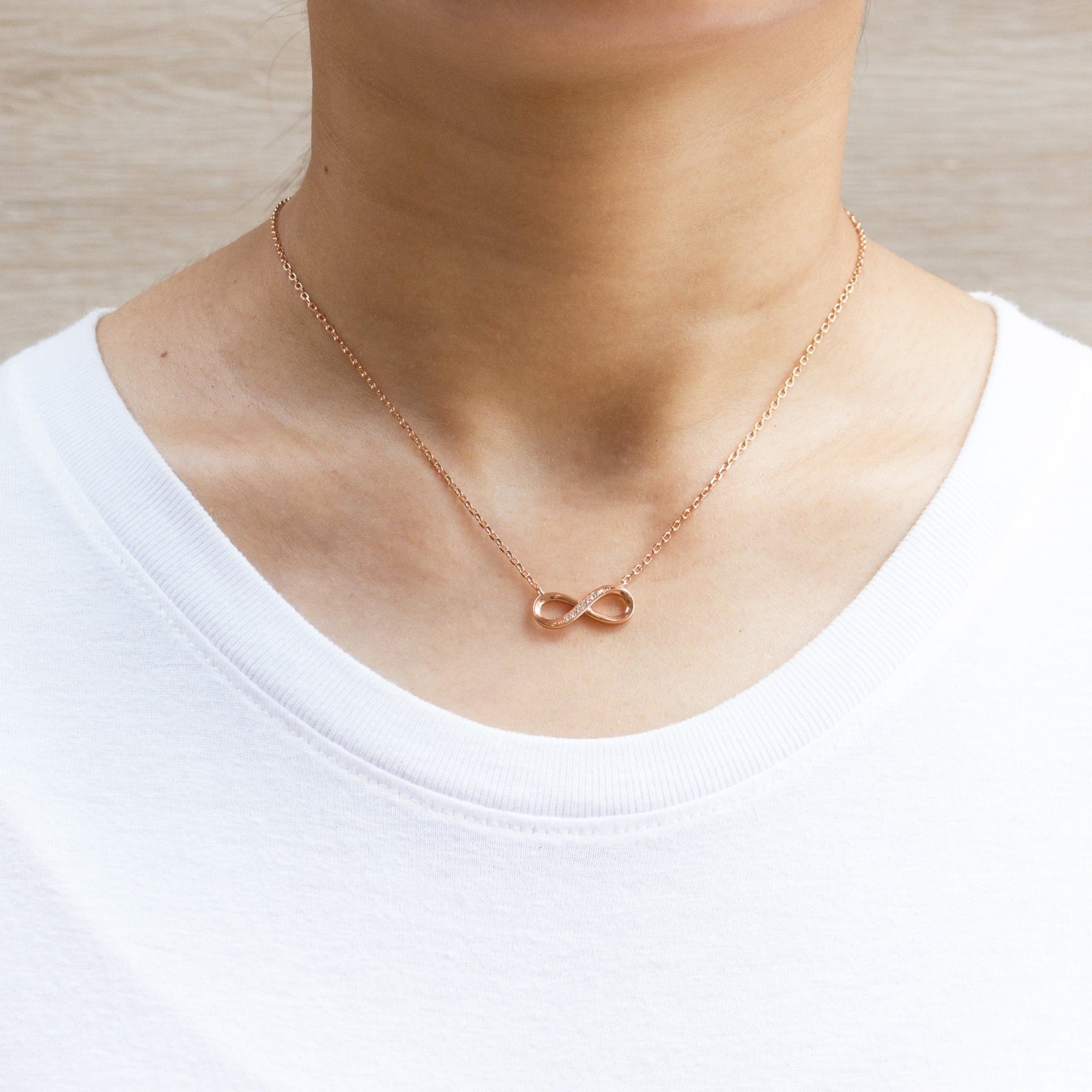 Rose Gold Plated Infinity Pendant Necklace Created with Zircondia® Crystals - Philip Jones Jewellery