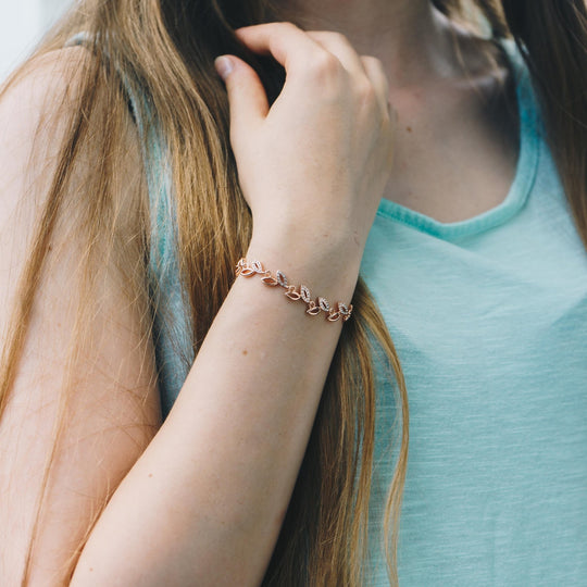 Rose Gold Plated Leaf Bracelet Created With Crystals From Zircondia® - Philip Jones Jewellery