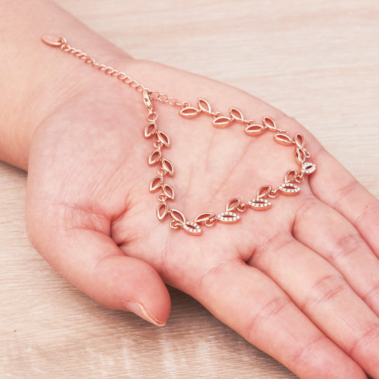 Rose Gold Plated Leaf Bracelet Created With Crystals From Zircondia® - Philip Jones Jewellery