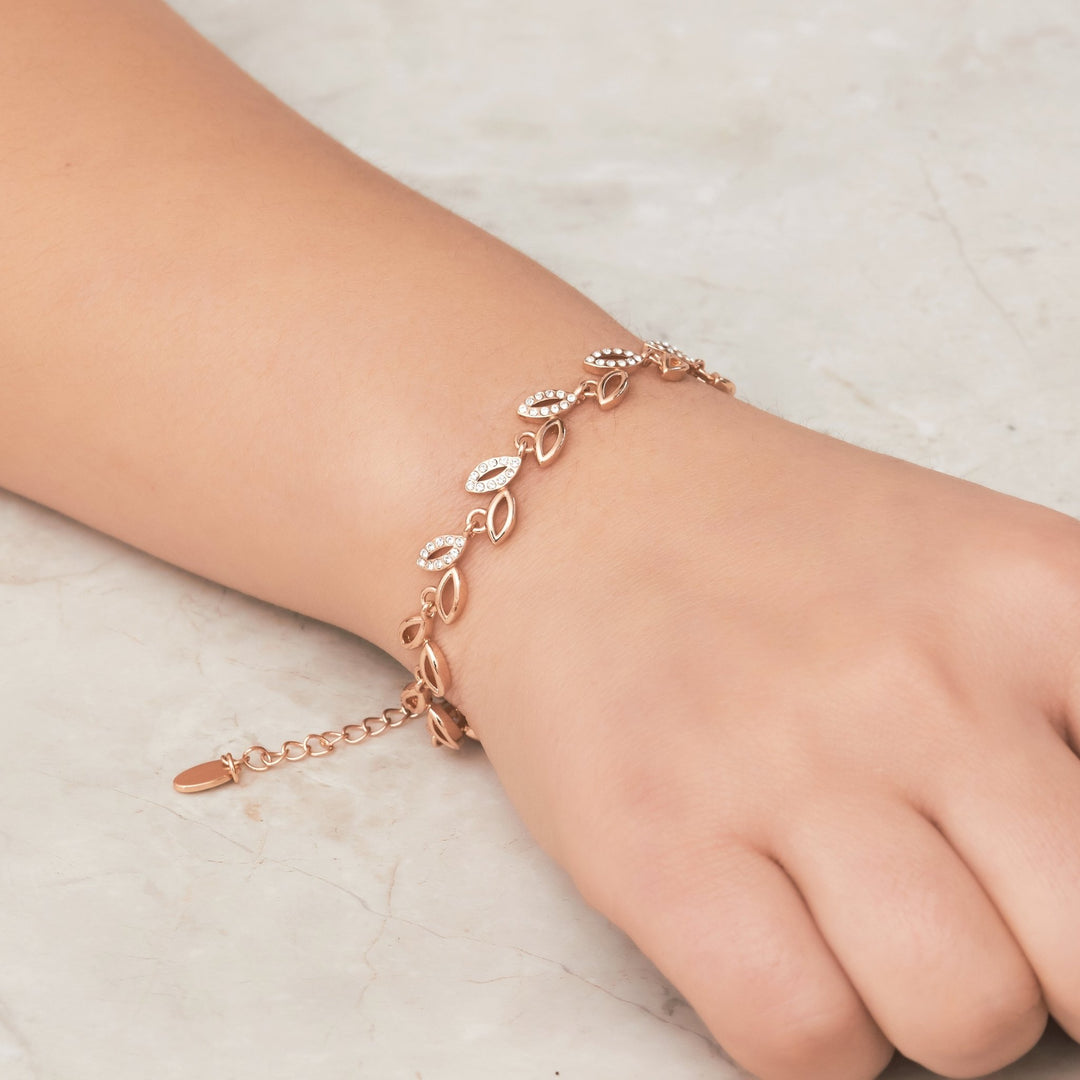 Rose Gold Plated Leaf Bracelet Created With Crystals From Zircondia® - Philip Jones Jewellery