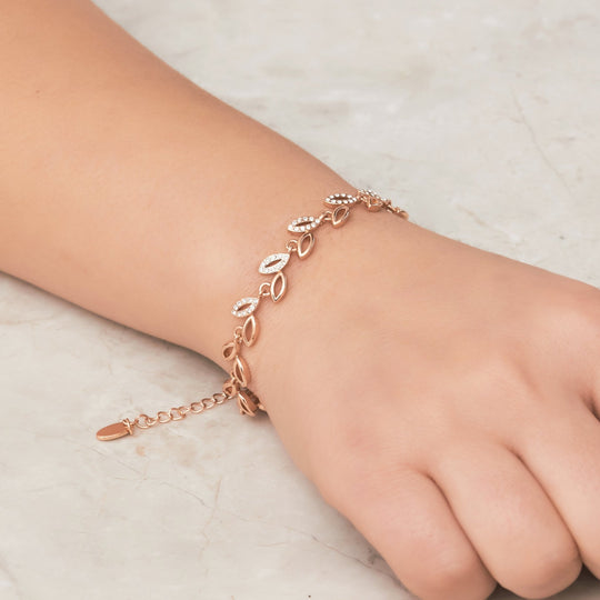 Rose Gold Plated Leaf Bracelet Created With Crystals From Zircondia® - Philip Jones Jewellery