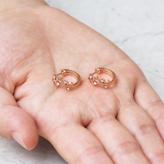 Rose Gold Plated Leaf Hoop Earrings Created with Zircondia® Crystals - Philip Jones Jewellery