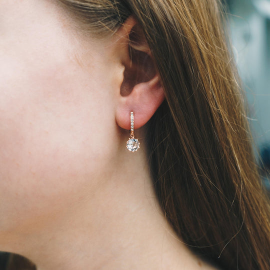 Rose Gold Plated Solitaire Drop Hoop Earrings Created with Zircondia® Crystals - Philip Jones Jewellery