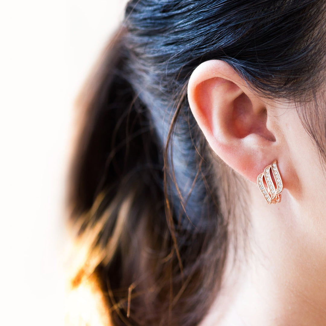 Rose Gold Plated Triple Row Clip On Earrings Created with Zircondia® Crystals - Philip Jones Jewellery