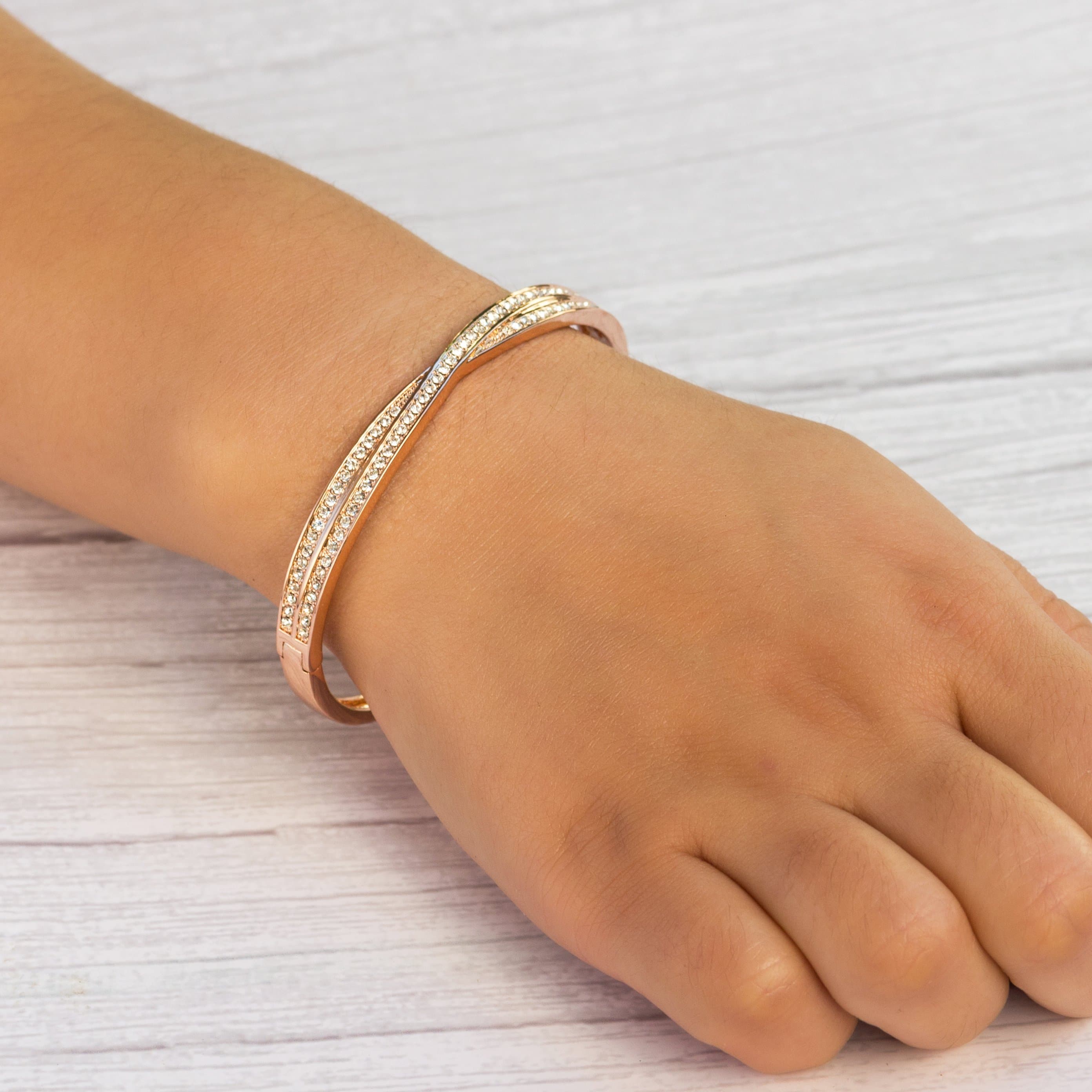 Rose Gold Plated Crossover Bangle Created with Zircondia® Crystals